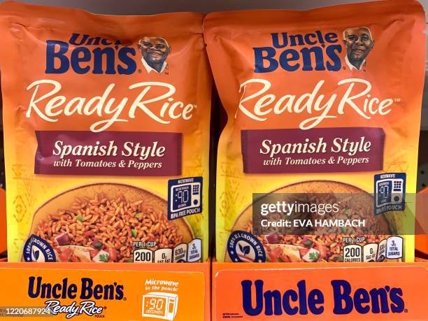 Bags of Uncle Ben's rice are seen on a store shelf on June 17, 2020 in Washington,DC. Amid nationwide protests against racism, major US food...