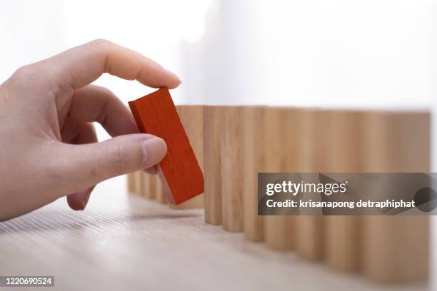 domino,wooden block,business risk, strategy and planing concept idea. - accident constant ストックフォトと画像