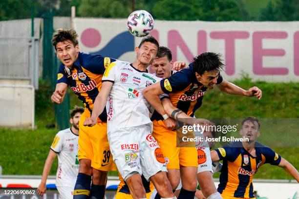 Maximilian Woeber of RB Salzburg, Stefan Goelles of Wolfsberg and Albert Vallci of RB Salzburg in action during the tipico Bundesliga match between...