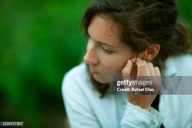 thoughtful woman - miscarriage stock-fotos und bilder