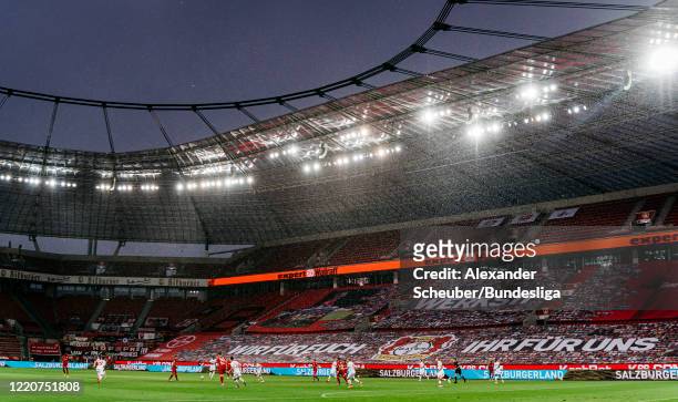 General view of both teams playing during the Bundesliga match between Bayer 04 Leverkusen and 1. FC Koeln at BayArena on June 17, 2020 in...