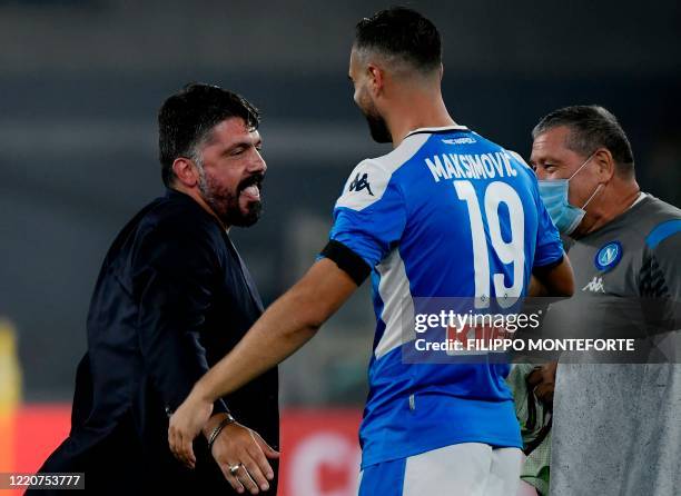 Napoli's Serbian defender Nikola Maksimovic and Napoli's Italian head coach Gennaro Gattuso celebrate after Napoli won the penalty shootout of the...