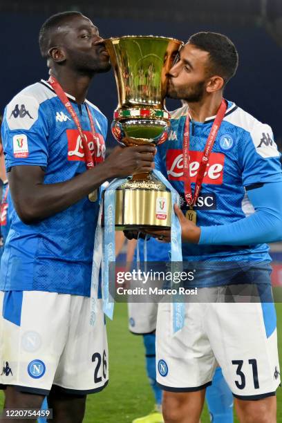 Kalidou Koulibaly and Faouzi Ghoulam of SSC Napoli celebrating with the trophy the winning of the Coppa Italia after the Coppa Italia the Coppa...