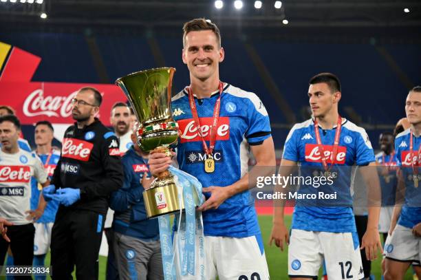 Arkadiusz Milik of SSC Napoli celebrating with the trophy the winning of the Coppa Italia after the Coppa Italia Final match between Juventus and SSC...