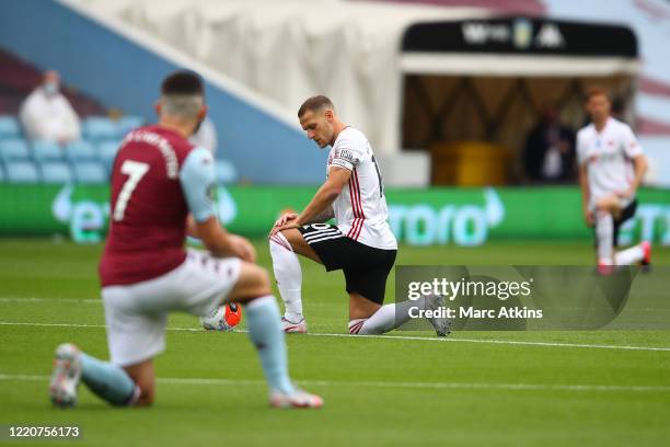 Billy Sharp of Sheffield United, along with his teammates and opposition, 'Take a Knee' in support of the Black Lives Matter movement after the...