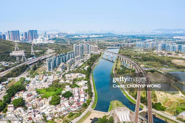 drone view of west rail line in yuen long district, hong kong - novos territórios imagens e fotografias de stock