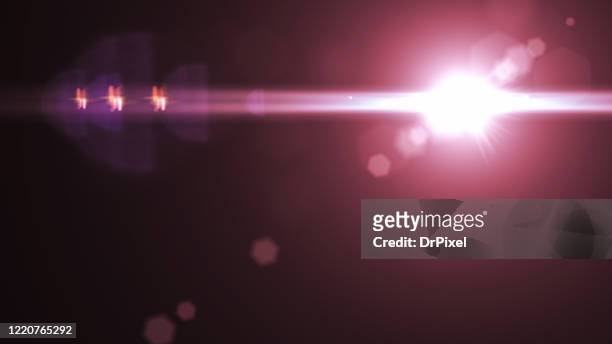lens flare on black background - lightning purple stock pictures, royalty-free photos & images