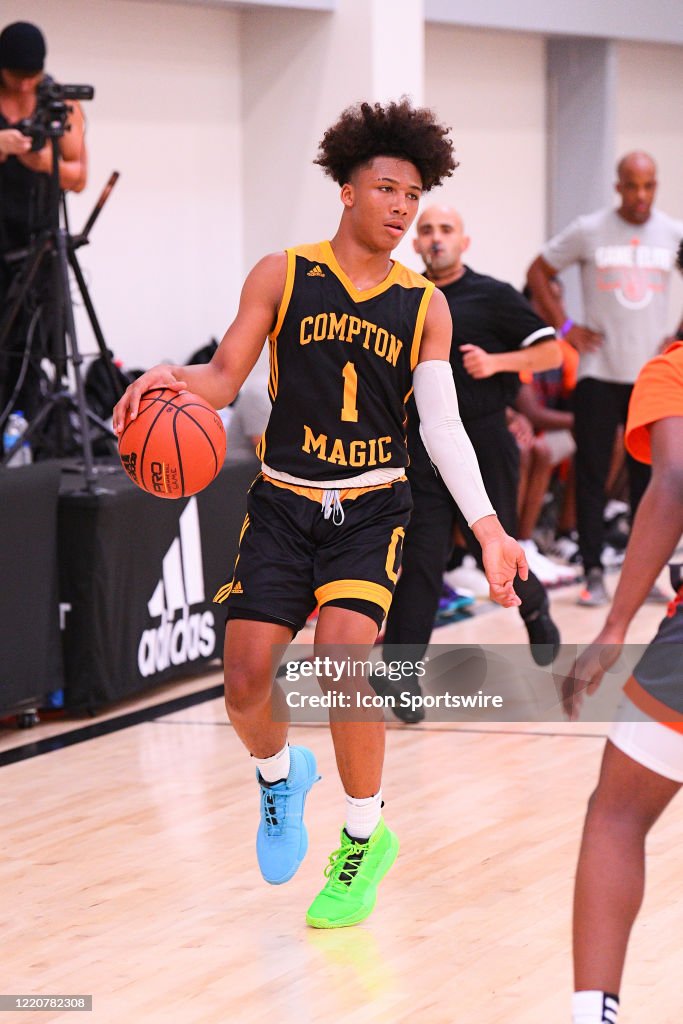 Compton Magic Compton Magic Mikey Williams brings the ball up the court during the ...