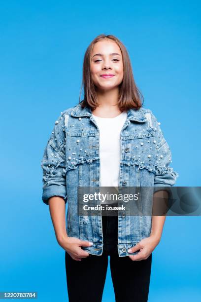 pretty female high school student - girls in blue jeans stock pictures, royalty-free photos & images