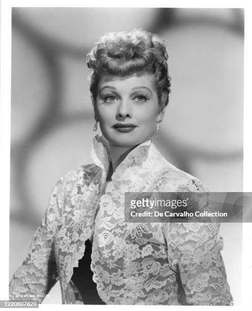 Lucille Ball wearing a white flowery costume in a publicity shot from the mid 50's, United States.