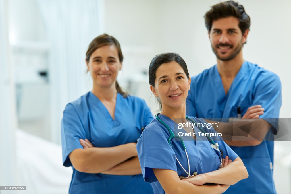 Nurse Using Camera Portrait Of Three Nurses Looking At Camera High-Res Stock Photo - Getty ...