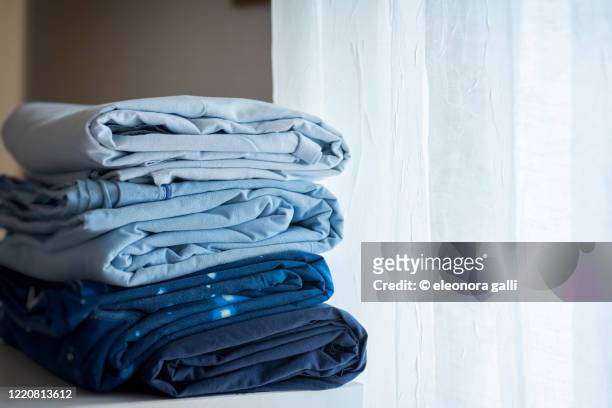 folded sheets - bedding stock pictures, royalty-free photos & images