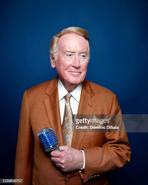 Sportscaster Vin Scully is photographed for ESPN.com at Dodger Stadium on June 4, 2013 in Los Angeles, California. PUBLISHED IMAGE.