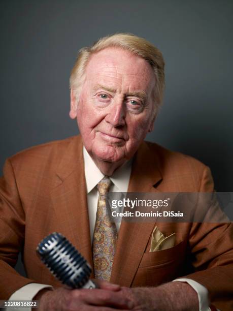 Sportscaster Vin Scully is photographed for ESPN.com at Dodger Stadium on June 4, 2013 in Los Angeles, California.