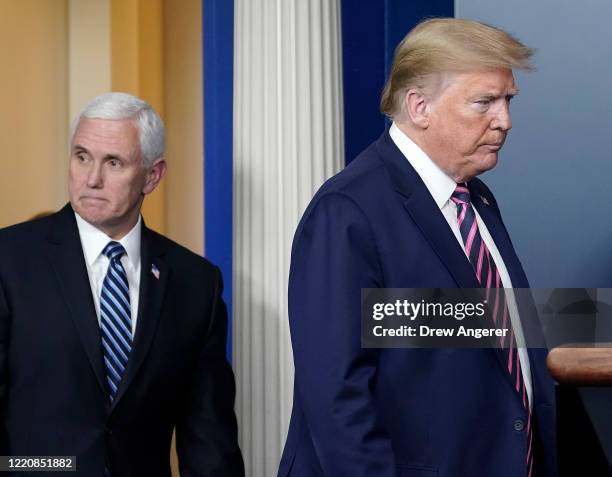 President Donald Trump and Vice President Mike Pence arrive at the daily coronavirus task force briefing at the White House on April 24, 2020 in...