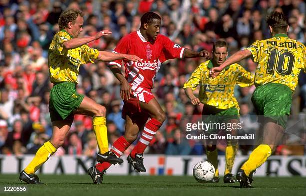 John Barnes of Liverpool takes on Jeremy Goss of Norwich City during the FA Carling Premiership match against Norwich City played at Anfield in...