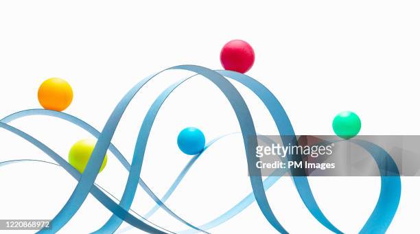 balls riding paper roller coaster - rolling stockfoto's en -beelden