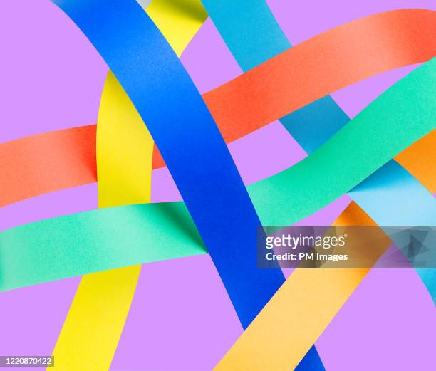 multi colored fabric of paper - paper art stock pictures, royalty-free photos & images
