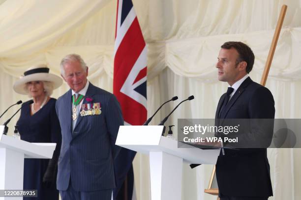 French president Emmanuel Macron delivers a speech, watched by Prince Charles, Prince of Wales, Camilla, Duchess of Cornwall during a ceremony at...