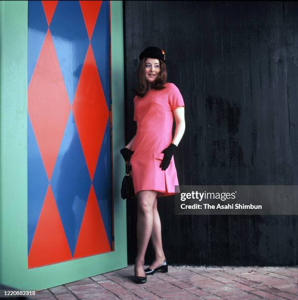 Hostess of the Belgium Pavilion poses for photographs as the Expo '70 preparation continues circa March 1970 in Suita, Osaka, Japan.