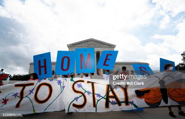 Dreamers and DACA supporters rally outside of the U.S. Supreme Court on Thursday, June 18 after the court rejected the Trump administrations push to...