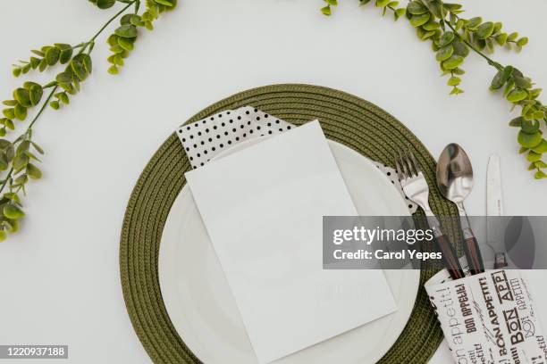 beautiful mock up with empty card, table setting with cutlery, and dinnerware on white background, top view, restaurant menu  1 credit essentials collection 9,00 € for this image save with flexible plans to suit every budget choose a plan edit this photo - wedding menu fotografías e imágenes de stock