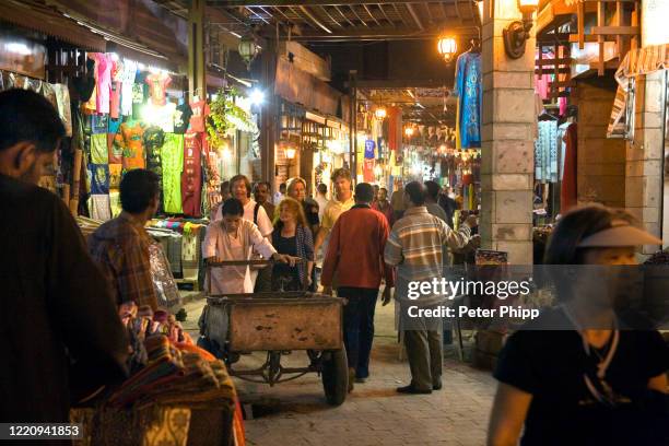 the souk at night in luxor. egypt - souk stock pictures, royalty-free photos & images