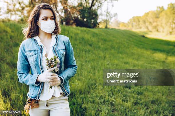 woman in the nature wearing protective face mask - ragweed photo stock pictures, royalty-free photos & images
