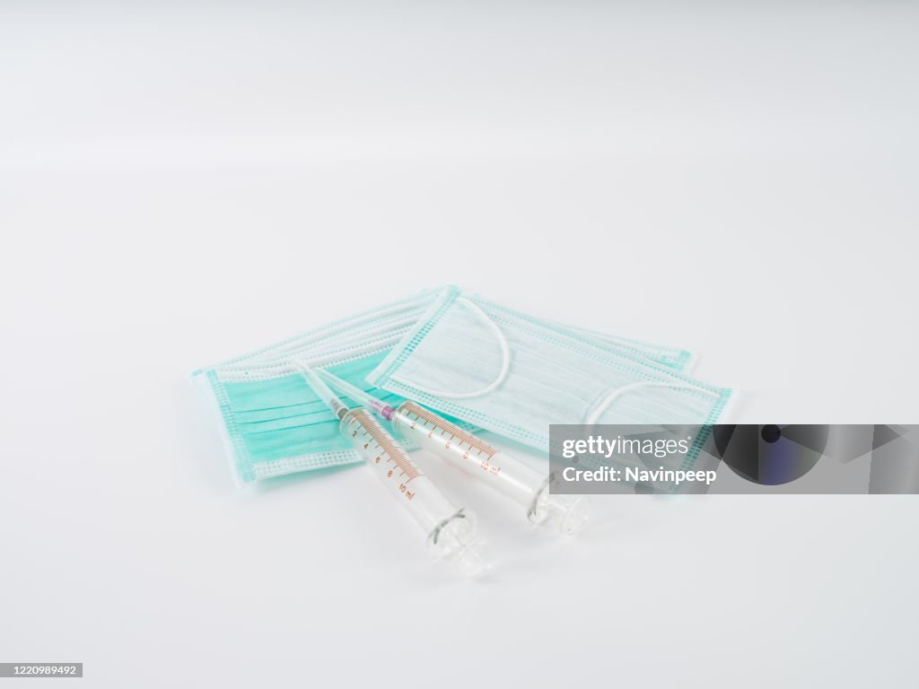 Mask and Syringe