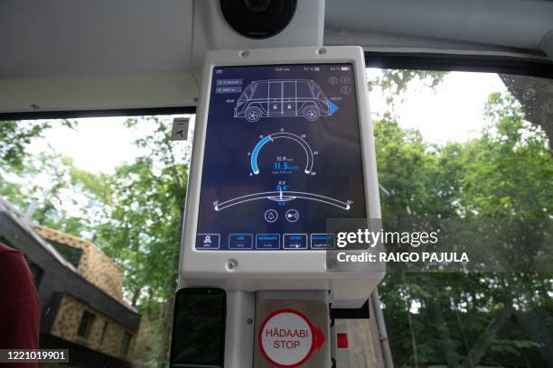 Picture taken on June 16, 2020 shows a screen on board a self-driving bus being tested out on tourist route in Tallin, Estonia. - The project is a...
