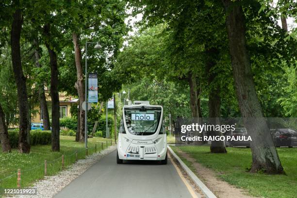 Picture taken on June 16, 2020 shows a self-driving bus being tested out on tourist route in Tallin, Estonia. - The project is a joint initiative...
