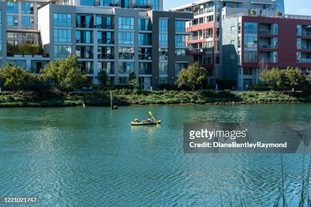 floating on a raft in san francisco - false bay stock pictures, royalty-free photos & images