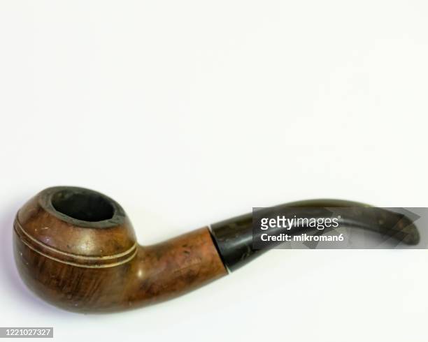 vintage wooden smoking pipe. smoking kills - pipe smoking pipe stock pictures, royalty-free photos & images