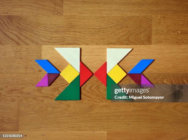 love and togetherness - tangram foto e immagini stock