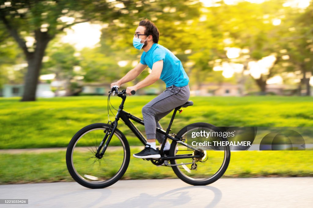 Teenager cycling on the neighborhood