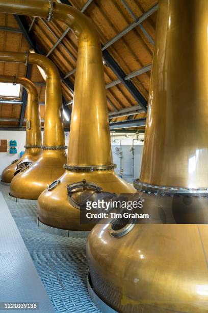 Copper pot whisky spirit still at Arran Whisky Distillery, one of the famous Scottish distilleries, at Lochranza, Isle of Arran, Scotland.