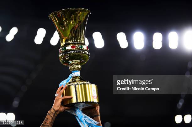 The Coppa Italia trophy is lifted during the awards ceremony at end of the Coppa Italia final football match between SSC Napoli and Juventus FC. SSC...