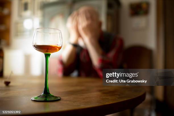 In this photo illustration an old man ashamed of his alcohol abuse on June 11, 2020 in Bonn, Germany.