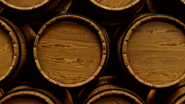 Wine or Whiskey barrels stacked at the winery. Looped animation.