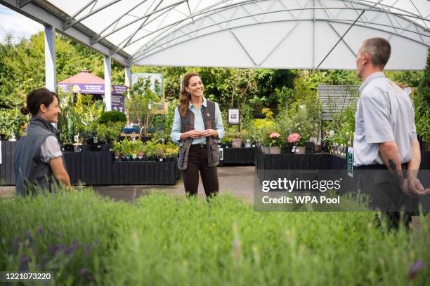 Catherine, Duchess of Cambridge talks to members of staff at Fakenham Garden Centre in Norfolk during her first public engagement since lockdown, on...