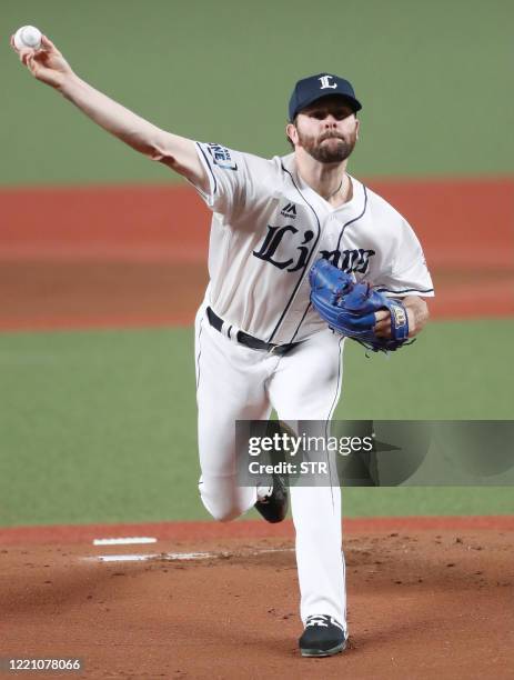 Seibu Lions starting pitcher Zach Neal throws the ball during the Japanese professional baseball match between Seibu and Nippon Ham at the Metlife...