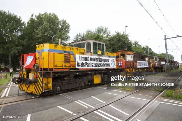 Locomotives role at the Tata Steel site during a protest in IJmuiden on June 19 as drivers want to draw attention to the future concerns they have...