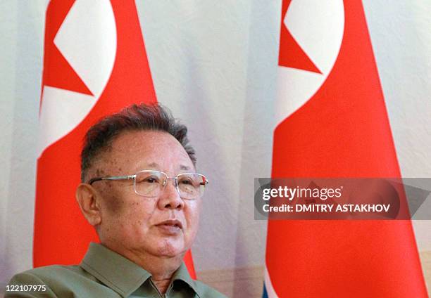 North Korea's leader Kim Jong-Il speaks with Russian President Dmitry Medvedev during their meeting at Sosnovy Bor Military Garrison, Zaigrayevsky...