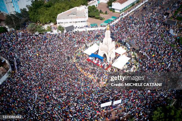 An aerial view shows protesters gathering for a demonstration in the Independence square in Bamako on June 19, 2020. - Imam Mahmoud Dicko, one of the...