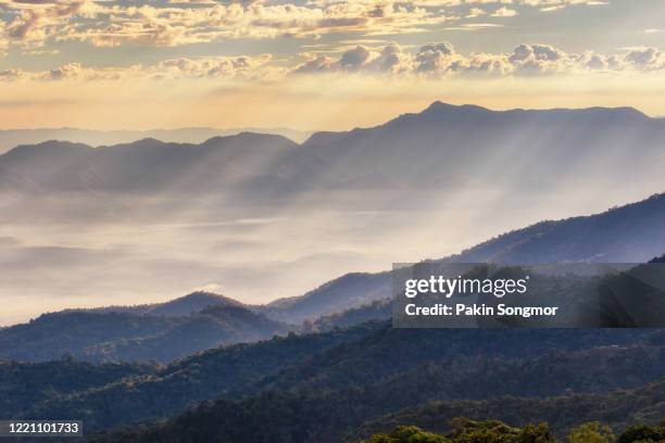 mountains and mist in sunrise time at at doi mae taman - high level summit stock pictures, royalty-free photos & images