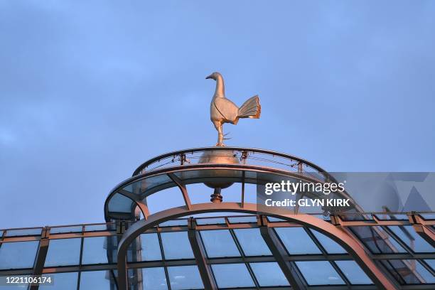 The Tottenham cockerel is seen on top of the stadium during the English Premier League football match between Tottenham Hotspur and Manchester United...