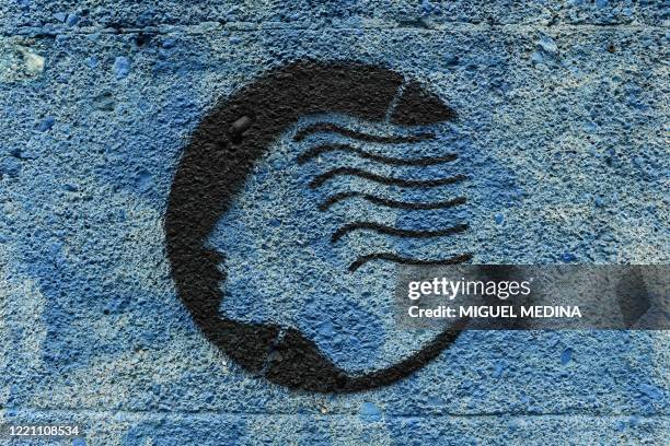 The logo of the Atalanta Bergamo football club is pictured on June 16, 2020 on a wall of the Atleti Azzurri d'Italia stadium in Bergamo. - Bergamo,...