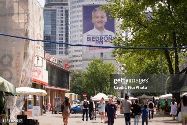 Large banner advertising presidential candidate Robert Biedron is seen on June 19, 2020 in Warsaw, Poland. On June 28 Poles will vote in the first...