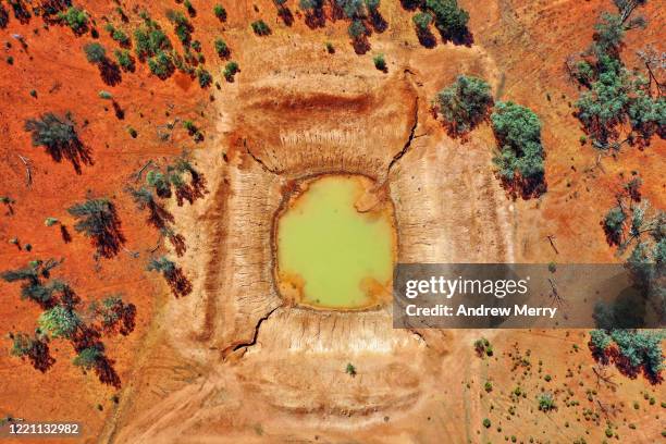 farm dam with green water, mud and almost empty, rural australia, aerial photography - australia desert stock pictures, royalty-free photos & images