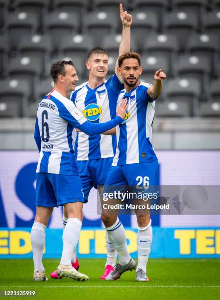 Vladimir Darida, Krzysztof Piatek and Matheus Cunha of Hertha BSC celebrate after scoring the 1:0 during the Bundesliga match between Hertha BSC and...